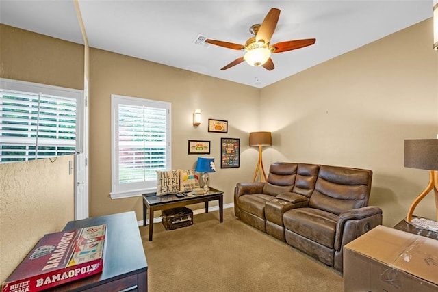 817 NW 76th St, Lawton, OK 73505 - living area with ceiling fan and carpet flooring