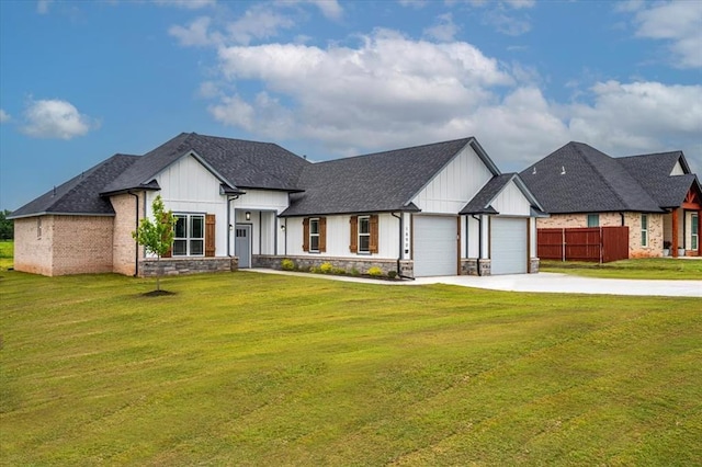 1890 E Industrial Rd, Guthrie, OK 73044 - modern inspired farmhouse featuring an attached garage, driveway, board and batten siding, a shingled roof, and stone siding