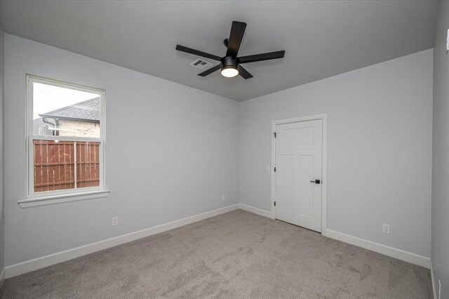 1890 E Industrial Rd, Guthrie, OK 73044 - spare room with carpet and ceiling fan