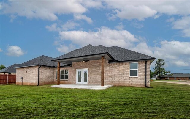 1890 E Industrial Rd, Guthrie, OK 73044 - back of house featuring french doors, a patio, brick siding, and roof with shingles