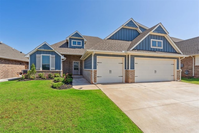 3621 NW 190th St, Edmond, OK 73012 - craftsman-style home featuring board and batten siding, concrete driveway, a front lawn, a garage, and brick siding