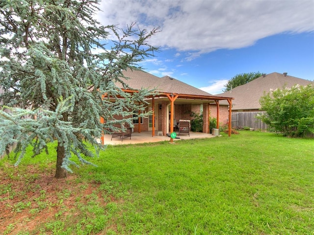 1205 NW 190th Pl, Edmond, OK 73012 - back of property with a patio