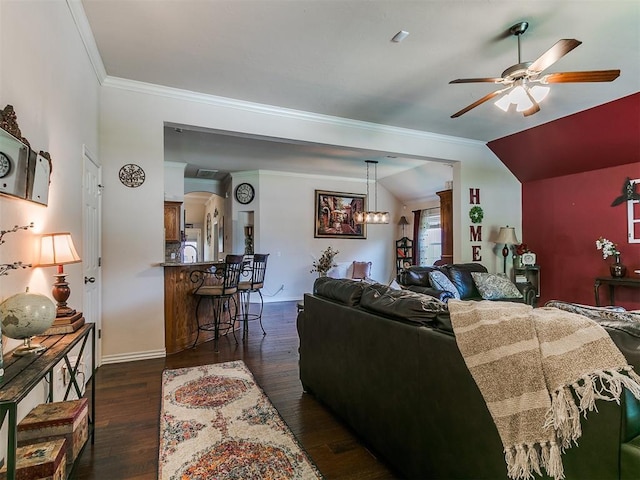 1205 NW 190th Pl, Edmond, OK 73012 - living room featuring ceiling fan, dark wood finished floors, ornamental molding, a chandelier, and lofted ceiling