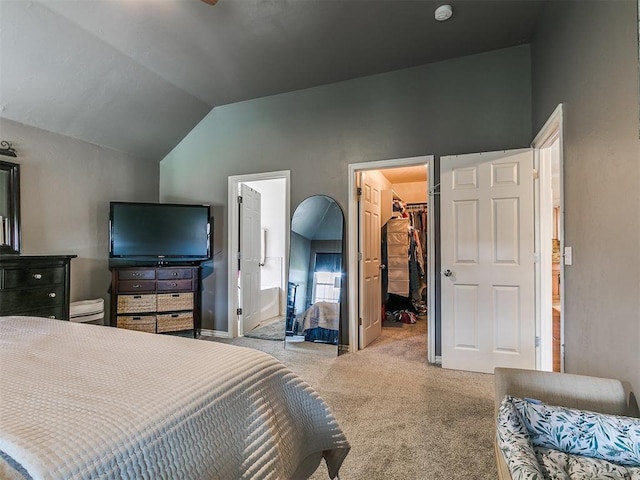 1205 NW 190th Pl, Edmond, OK 73012 - bedroom featuring carpet, a spacious closet, vaulted ceiling, and a closet