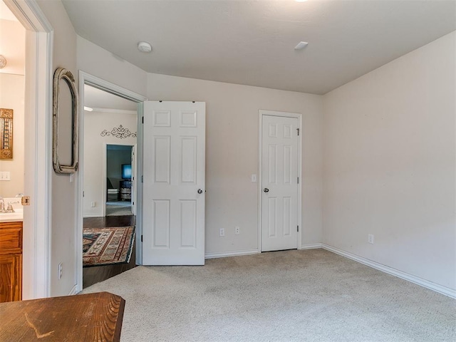 1205 NW 190th Pl, Edmond, OK 73012 - unfurnished bedroom featuring carpet flooring and connected bathroom