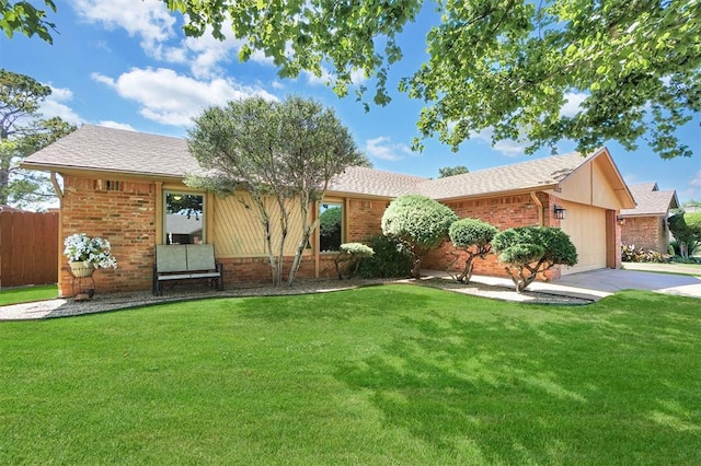 3217 Quail Cir, Altus, OK 73521 - ranch-style home with brick siding, an attached garage, roof with shingles, and concrete driveway