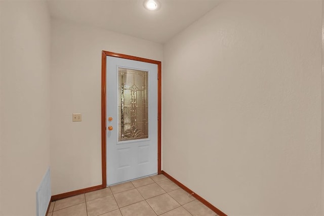3217 Quail Cir, Altus, OK 73521 - doorway to outside with baseboards and light tile patterned floors