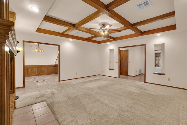 3217 Quail Cir, Altus, OK 73521 - empty room with light tile patterned floors, coffered ceiling, a chandelier, beamed ceiling, and ceiling fan