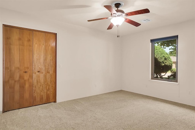 3217 Quail Cir, Altus, OK 73521 - unfurnished bedroom featuring carpet and a ceiling fan
