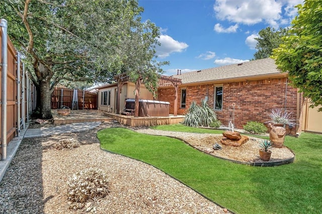 3217 Quail Cir, Altus, OK 73521 - back of property with a pergola, a fenced backyard, a patio area, brick siding, and roof with shingles