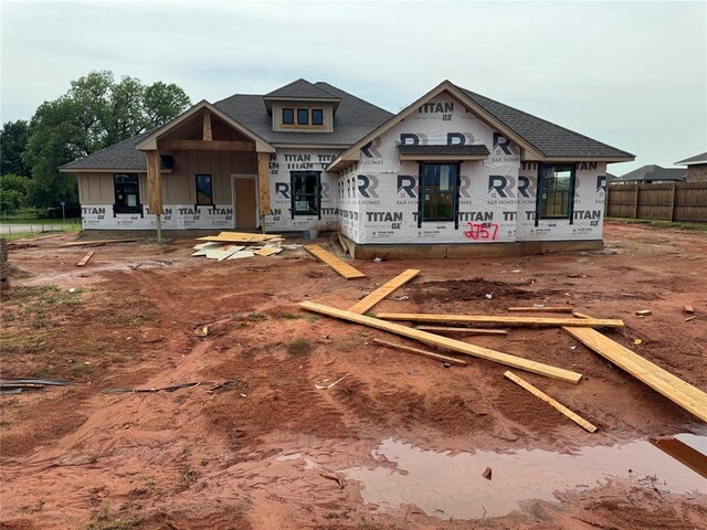 2757 Sherwood Ct, Newcastle, OK 73065 - property under construction with board and batten siding and uncovered parking