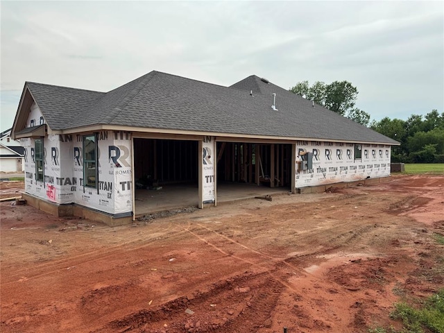 2757 Sherwood Ct, Newcastle, OK 73065 - view of property exterior featuring a shingled roof and a garage
