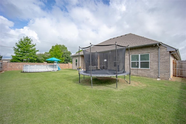 1540 17th Pl, Newcastle, OK 73065 - fenced backyard with a trampoline