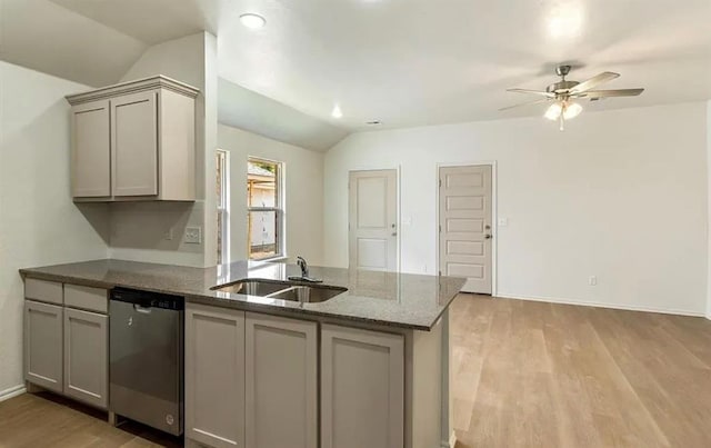 1426 SW Oklahoma Ave, Lawton, OK 73501 - kitchen with dishwasher, gray cabinets, vaulted ceiling, a ceiling fan, and light wood-type flooring