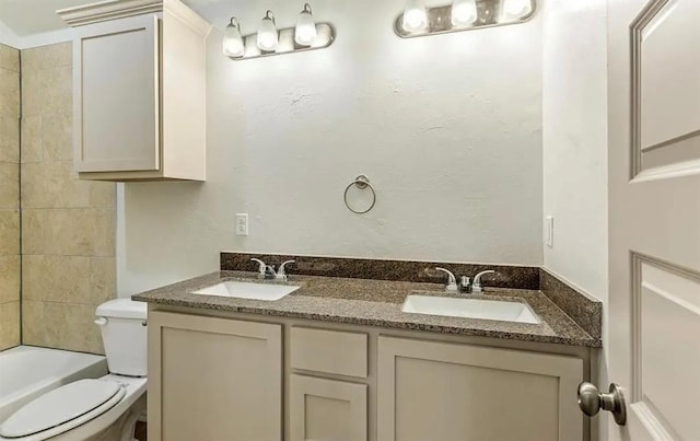 1426 SW Oklahoma Ave, Lawton, OK 73501 - bathroom featuring double vanity and shower / bathtub combination