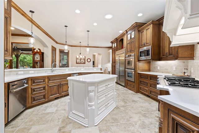 1605 Hidden Lake Dr, Edmond, OK 73034 - kitchen featuring custom exhaust hood, built in appliances, light countertops, arched walkways, and crown molding