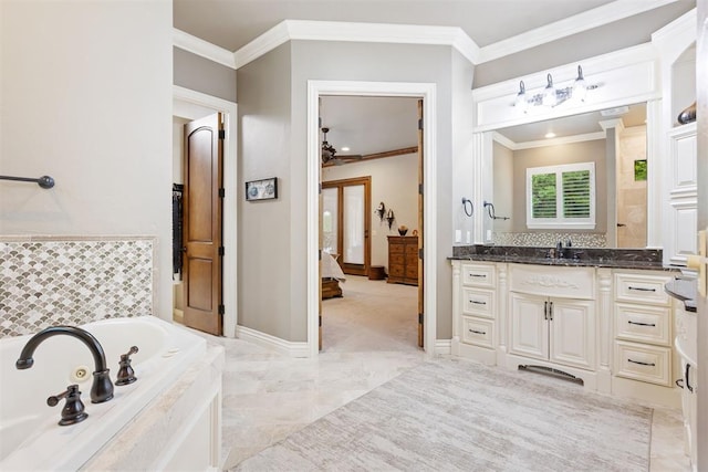 1605 Hidden Lake Dr, Edmond, OK 73034 - ensuite bathroom with a ceiling fan, a garden tub, vanity, ornamental molding, and marble finish floors