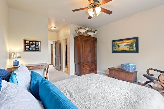 1605 Hidden Lake Dr, Edmond, OK 73034 - bedroom with light colored carpet and ceiling fan