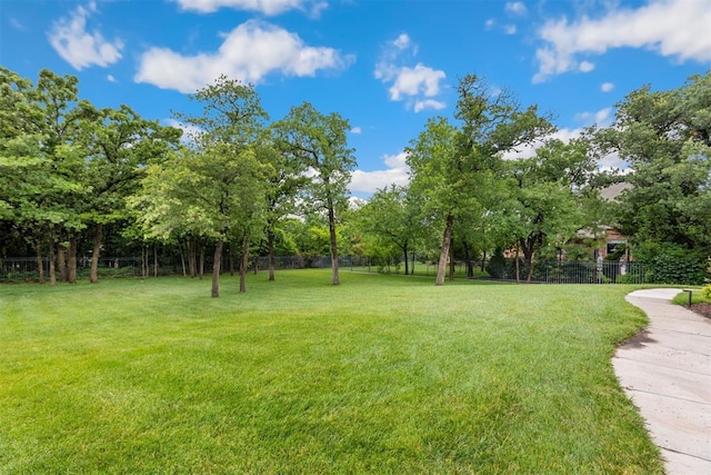 1605 Hidden Lake Dr, Edmond, OK 73034 - view of yard with view of wooded area