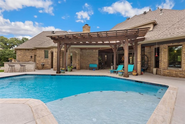 1605 Hidden Lake Dr, Edmond, OK 73034 - outdoor pool featuring a pergola and a patio area