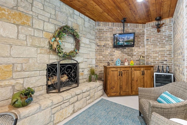 1605 Hidden Lake Dr, Edmond, OK 73034 - living area with wood ceiling and a fireplace