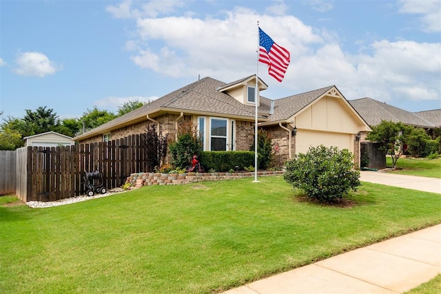 1604 Central Pkwy, Norman, OK 73071 - view of front facade with driveway, brick siding, an attached garage, and a shingled roof