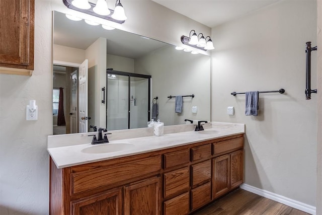 1604 Central Pkwy, Norman, OK 73071 - bathroom with double vanity, wood finished floors, and a shower stall