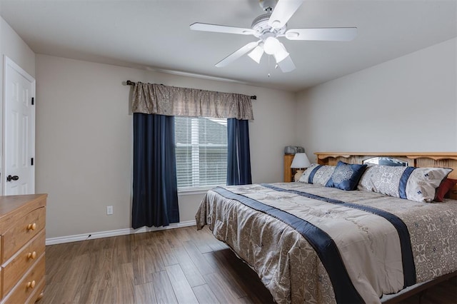 1604 Central Pkwy, Norman, OK 73071 - bedroom with wood finished floors and a ceiling fan