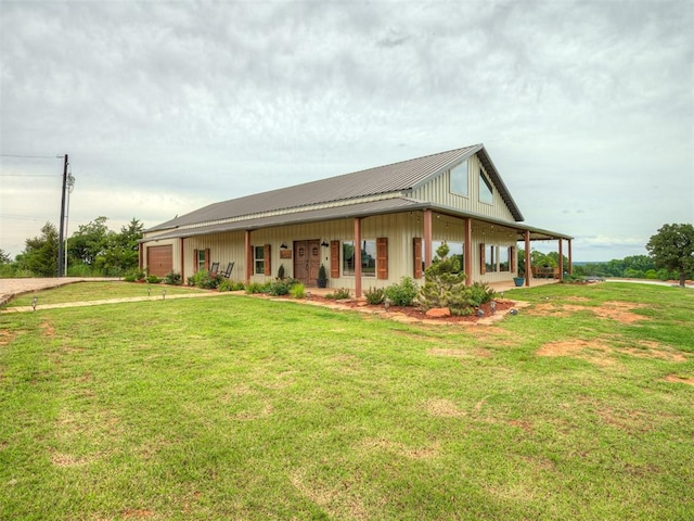 4920 W Forrest Hills Rd, Guthrie, OK 73044 - country-style home featuring a front yard, a metal roof, board and batten siding, and a garage