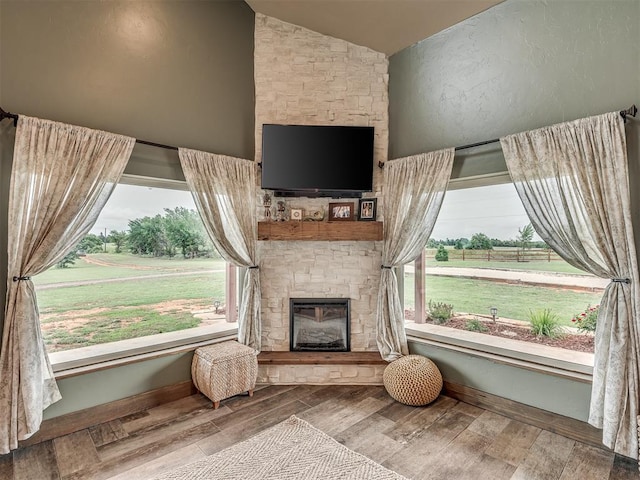 4920 W Forrest Hills Rd, Guthrie, OK 73044 - living room with a fireplace, lofted ceiling, and wood finished floors