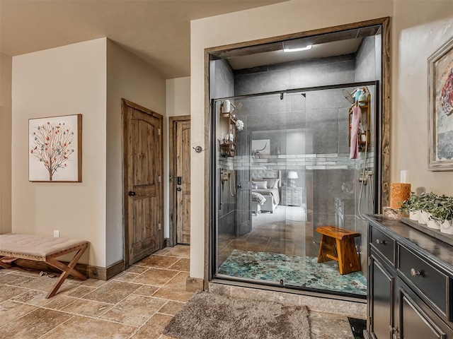 4920 W Forrest Hills Rd, Guthrie, OK 73044 - full bath featuring a stall shower, stone tile flooring, and vanity