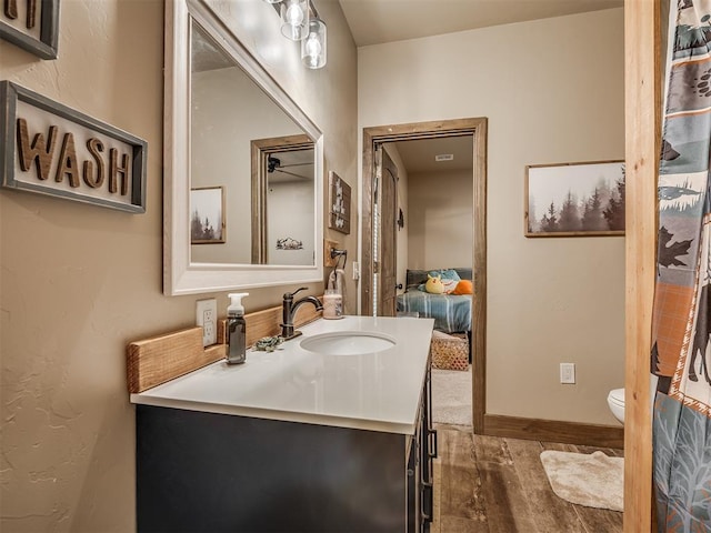 4920 W Forrest Hills Rd, Guthrie, OK 73044 - full bathroom featuring vanity and wood finished floors