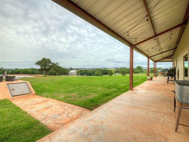 4920 W Forrest Hills Rd, Guthrie, OK 73044 - view of green lawn with a patio