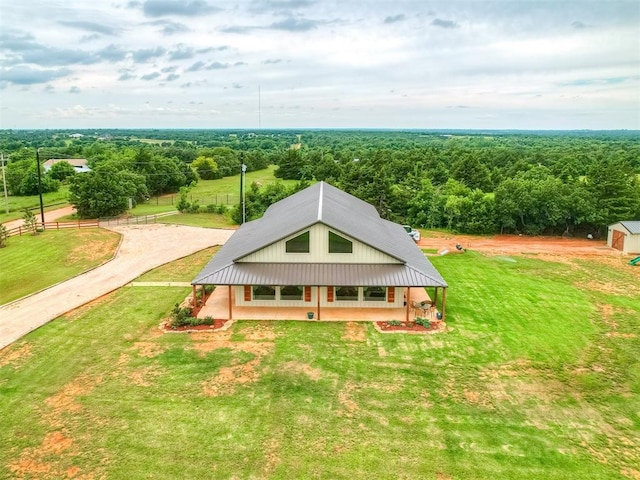 4920 W Forrest Hills Rd, Guthrie, OK 73044 - aerial view of property and surrounding area with a heavily wooded area