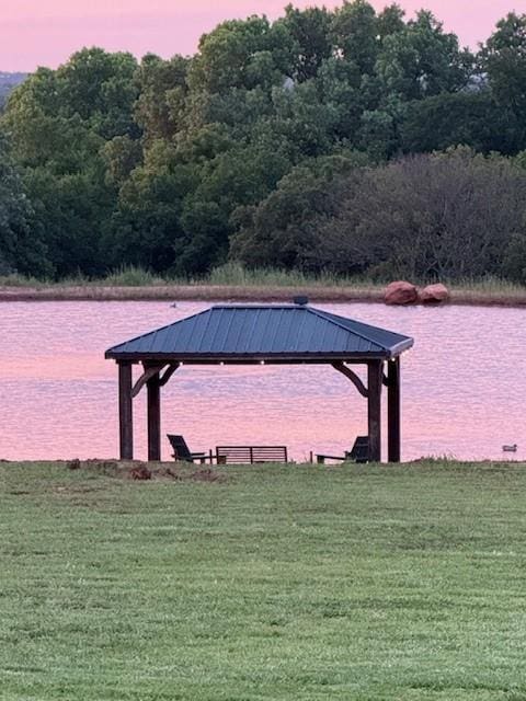 4920 W Forrest Hills Rd, Guthrie, OK 73044 - dock area featuring a lawn, a water view, a gazebo, and a forest view
