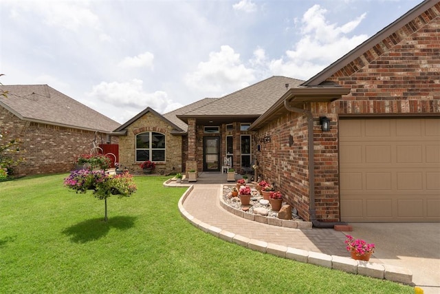 12816 NW 6th St, Yukon, OK 73099 - view of green lawn featuring a garage