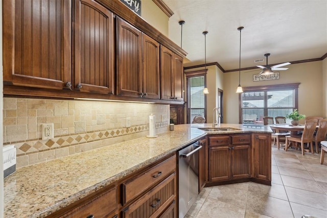 12816 NW 6th St, Yukon, OK 73099 - kitchen with tasteful backsplash, dishwasher, ceiling fan, ornamental molding, and a peninsula