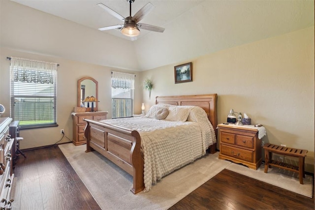 12816 NW 6th St, Yukon, OK 73099 - bedroom featuring wood-type flooring, multiple windows, lofted ceiling, and a ceiling fan