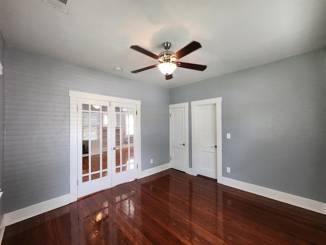 2719 NW 14th St, Oklahoma City, OK 73107 - empty room with wood finished floors, ceiling fan, and french doors