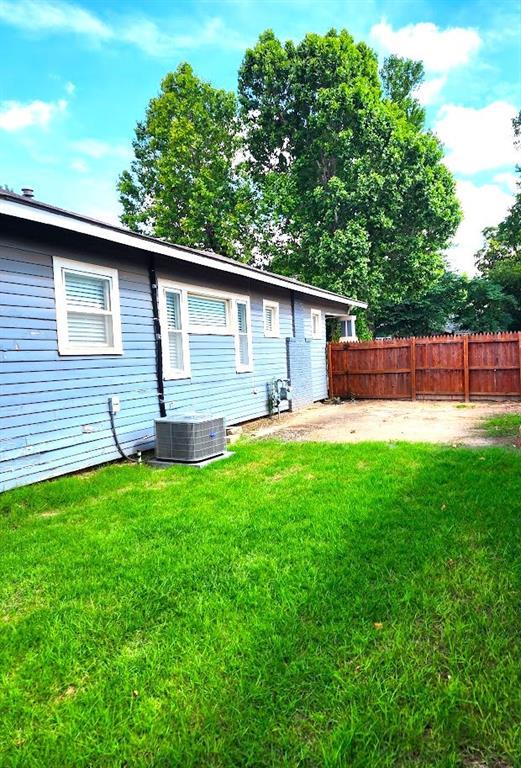 2719 NW 14th St, Oklahoma City, OK 73107 - rear view of property with a patio