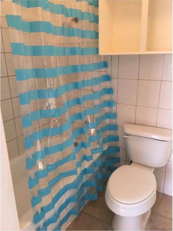6101 S Douglas Ave, Oklahoma City, OK 73139 - full bathroom featuring tile walls, tile patterned flooring, and shower / bath combo