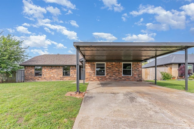 1004 Ranchoak Ct, Yukon, OK 73099 - view of front of house with brick siding, concrete driveway, and an attached carport