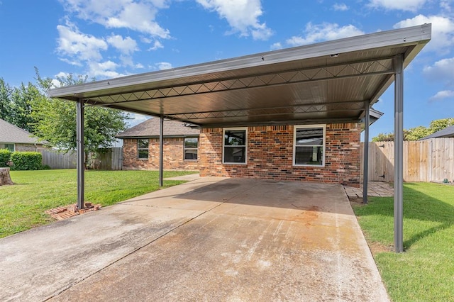 1004 Ranchoak Ct, Yukon, OK 73099 - view of patio / terrace with a carport and driveway