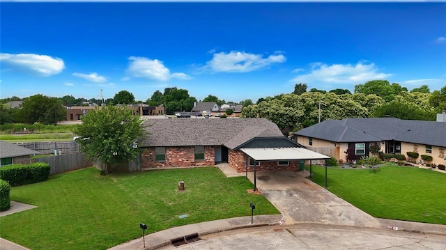 1004 Ranchoak Ct, Yukon, OK 73099 - ranch-style house with concrete driveway and a carport
