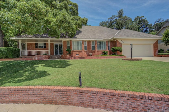 4973 NW 31st Ter, Oklahoma City, OK 73122 - ranch-style home with brick siding, an attached garage, driveway, a front lawn, and covered porch