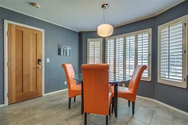 4973 NW 31st Ter, Oklahoma City, OK 73122 - dining area featuring plenty of natural light and ornamental molding