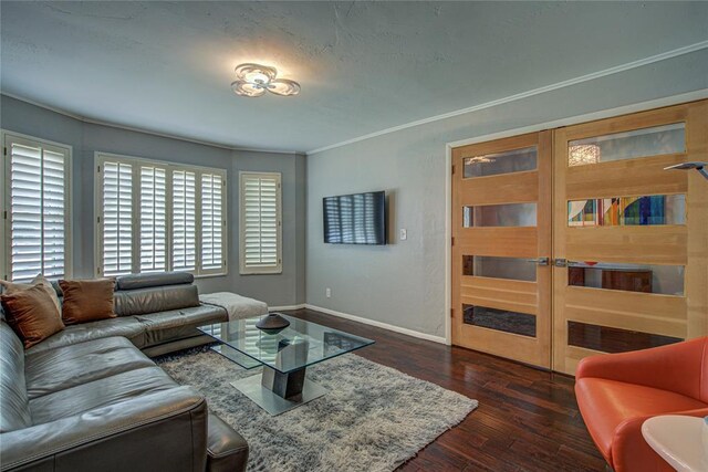 4973 NW 31st Ter, Oklahoma City, OK 73122 - living room with dark wood-style floors and ornamental molding
