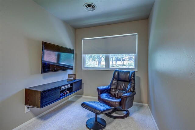 4973 NW 31st Ter, Oklahoma City, OK 73122 - living area with carpet flooring and baseboards