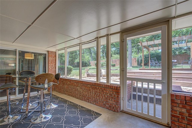 4973 NW 31st Ter, Oklahoma City, OK 73122 - sunroom with brick wall