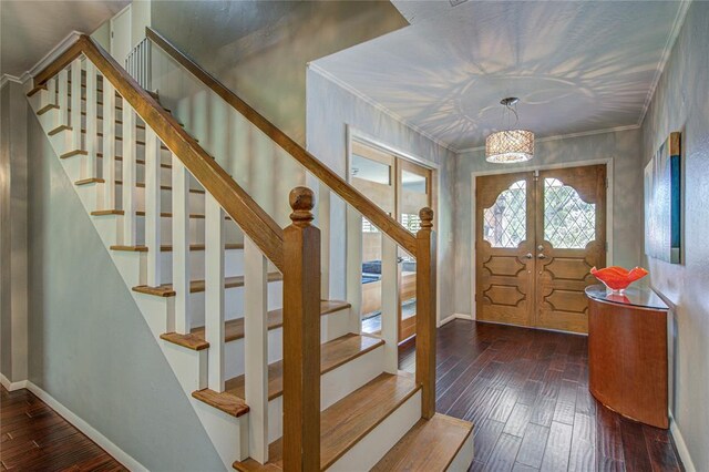 4973 NW 31st Ter, Oklahoma City, OK 73122 - entrance foyer with wood-type flooring, stairway, ornamental molding, and french doors